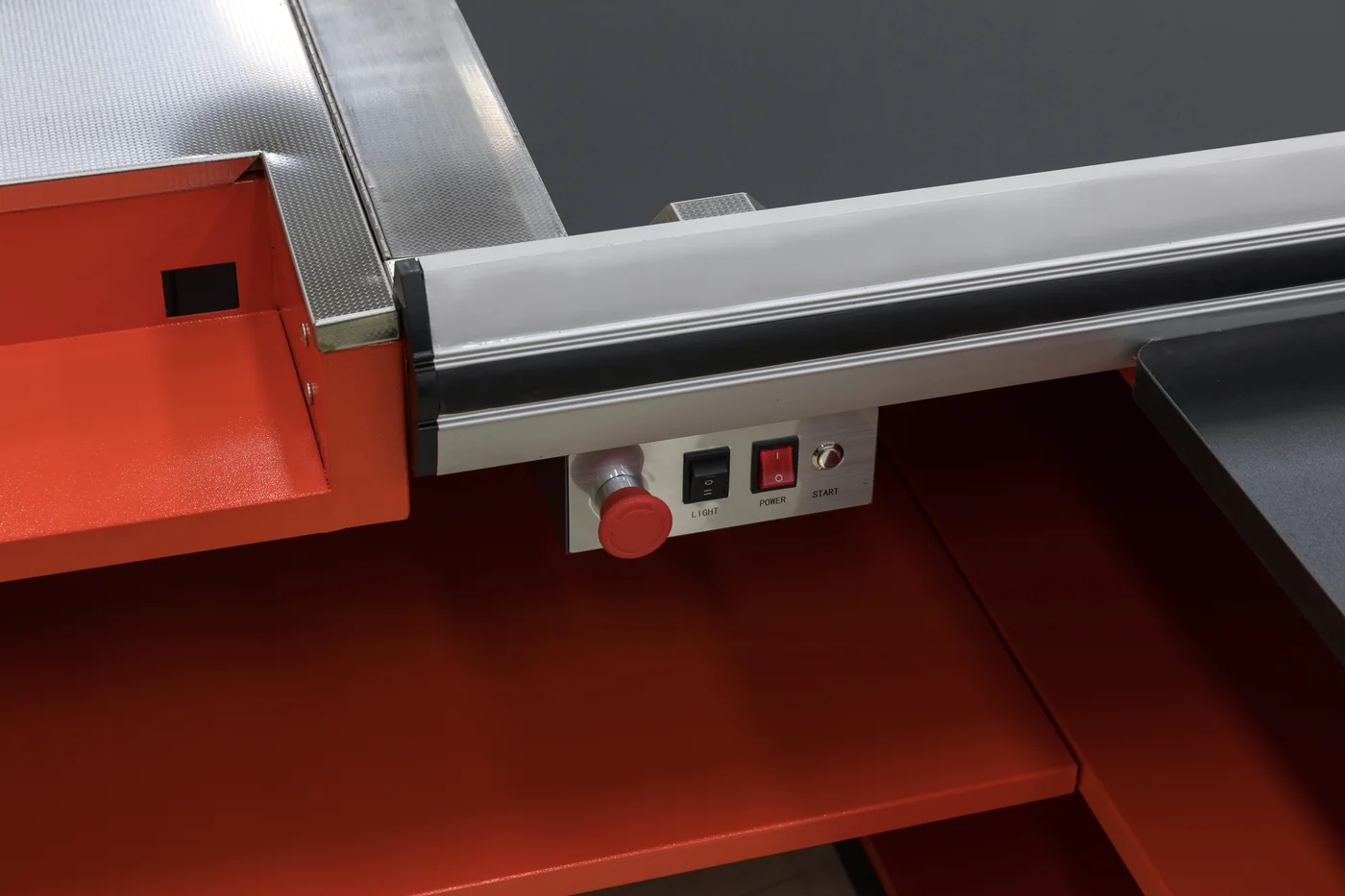 Red powder-coated steel surface on a Keshun checkout counter