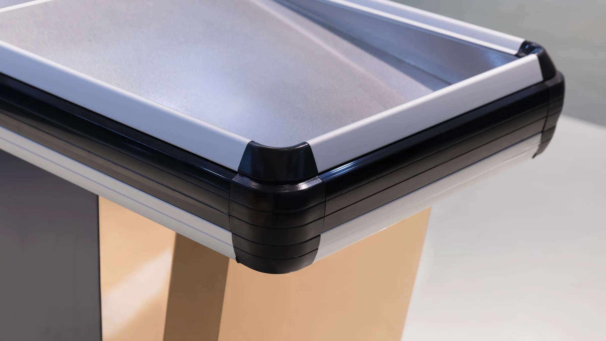 A row of different checkout counter types side by side on the Keshun showroom floor