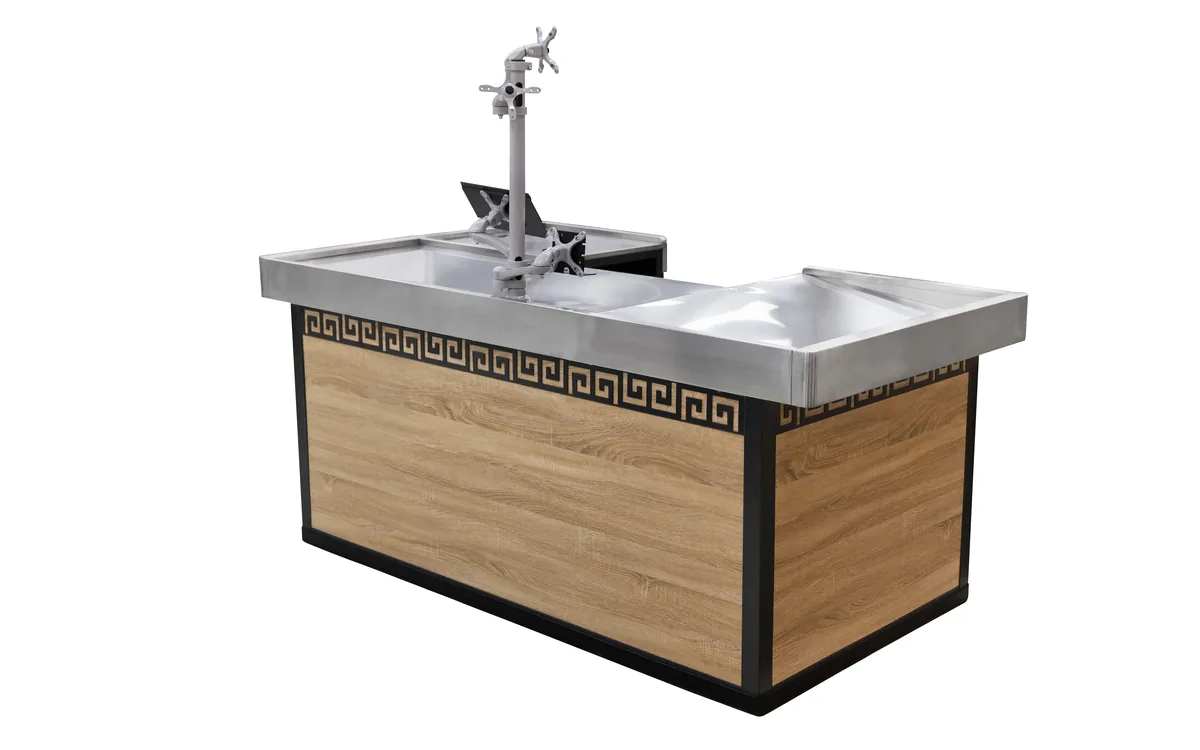 L shaped convenience store checkout counter with a raised service screen and timber panelling