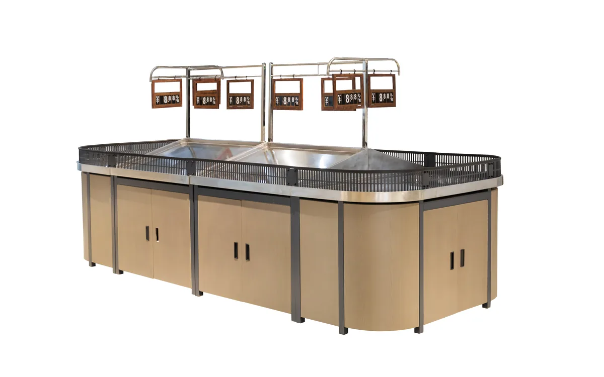 Supermarket produce island with an overhead price header, stainless trays and timber clad bases