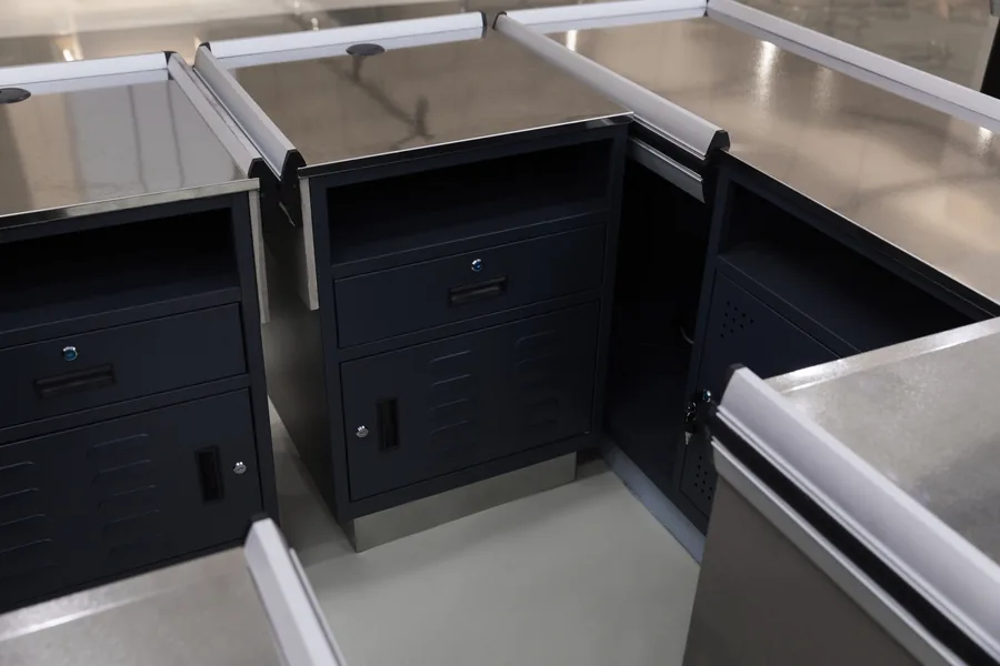 Lockable cash drawer and louvred ventilated cabinet door on a Keshun counter cashier desk