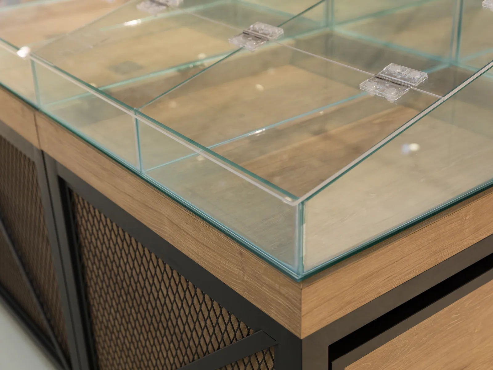 Close-up of a timber grain display body and shelf edge on a Keshun supermarket fixture