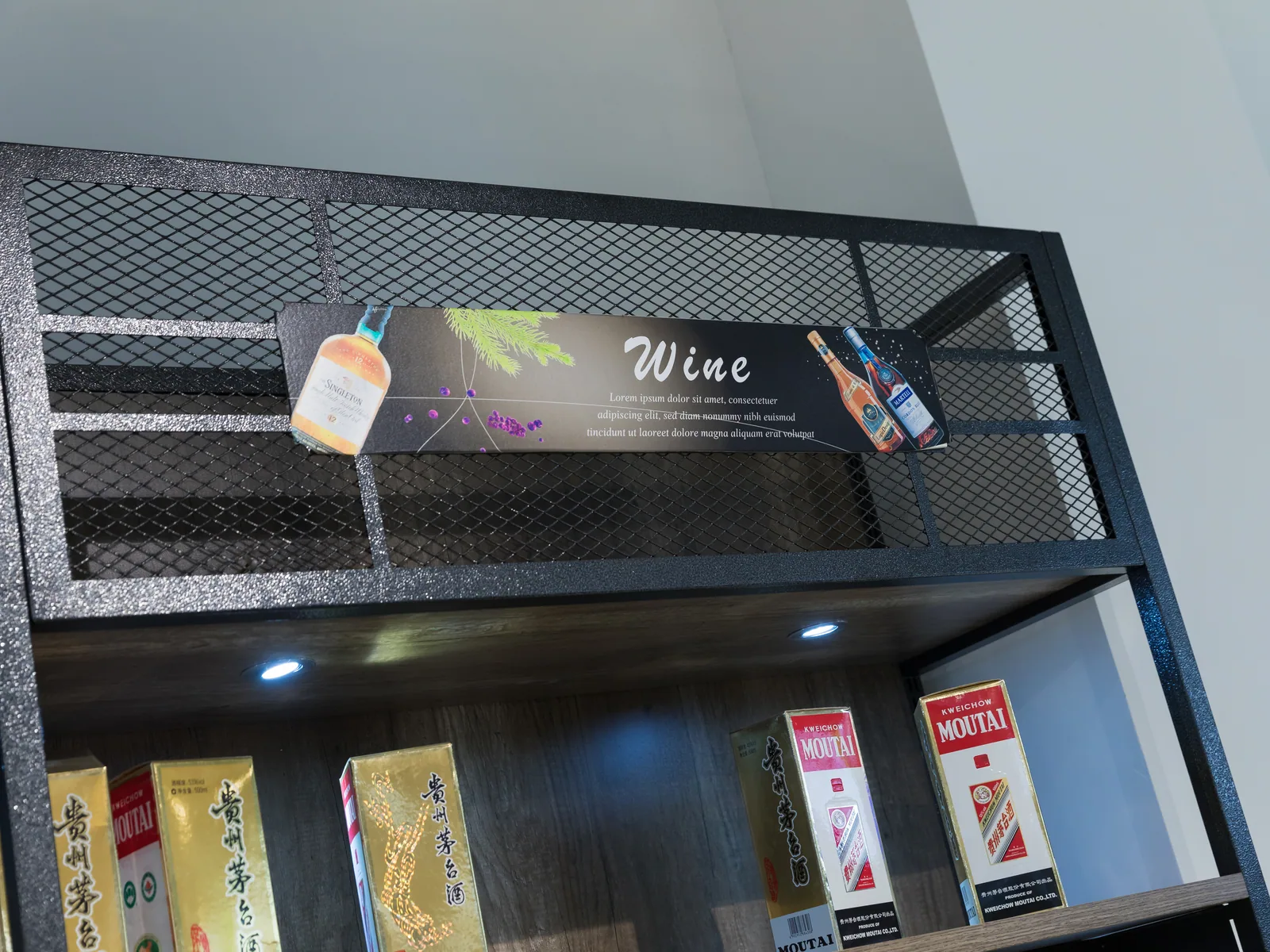 Close-up of timber bottle shelving on a Keshun supermarket wine display run