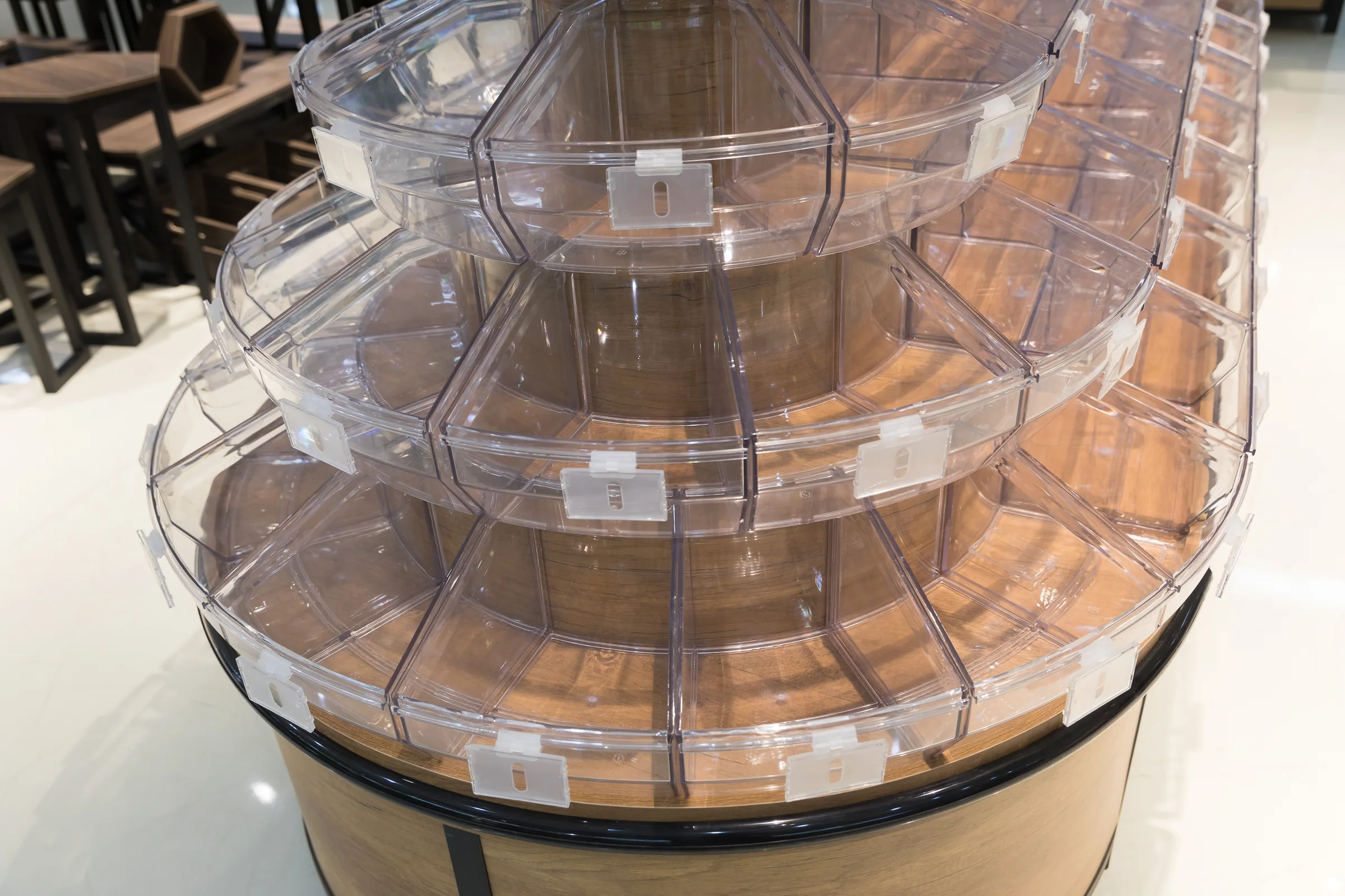 Keshun five tier tilt bin island in golden timber with clear bins stepped up the face