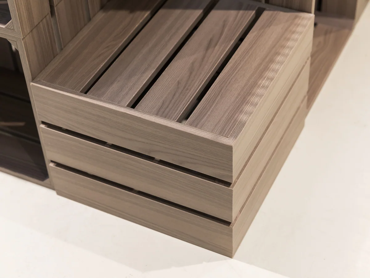 Close-up of a single timber crate showing the slatted sides