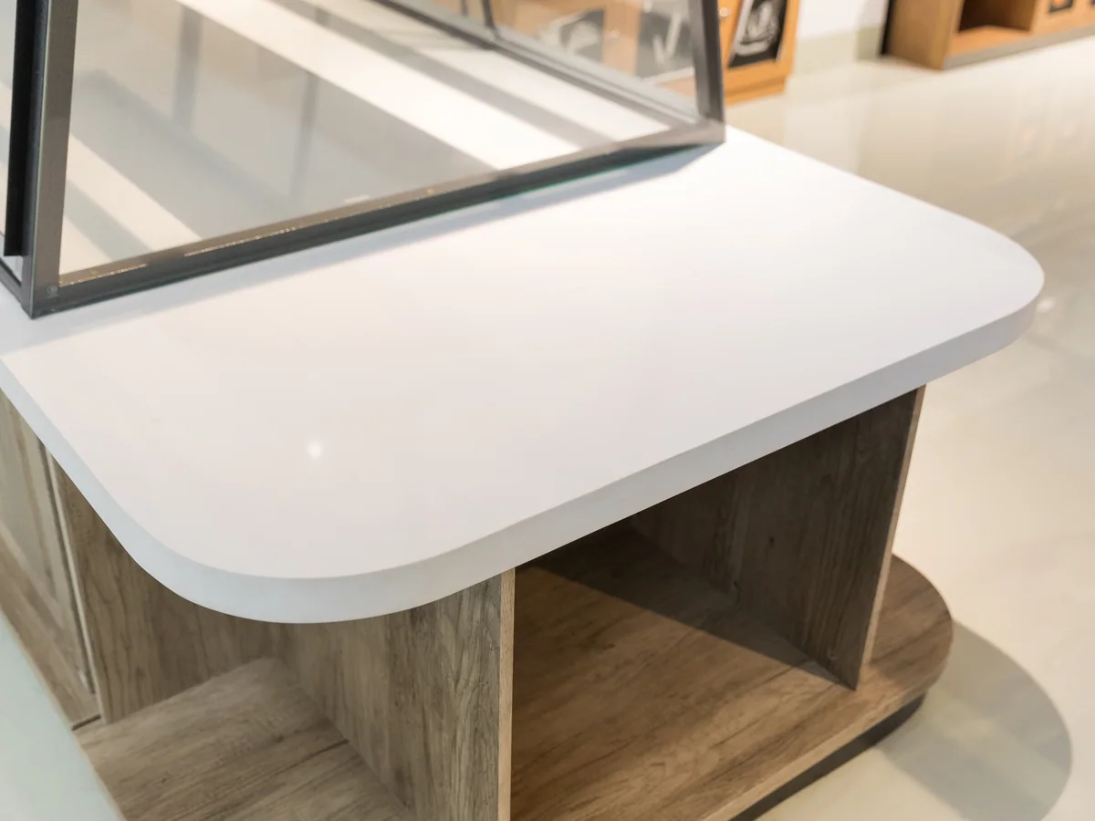 Close-up of the curved glass front of the bakery counter