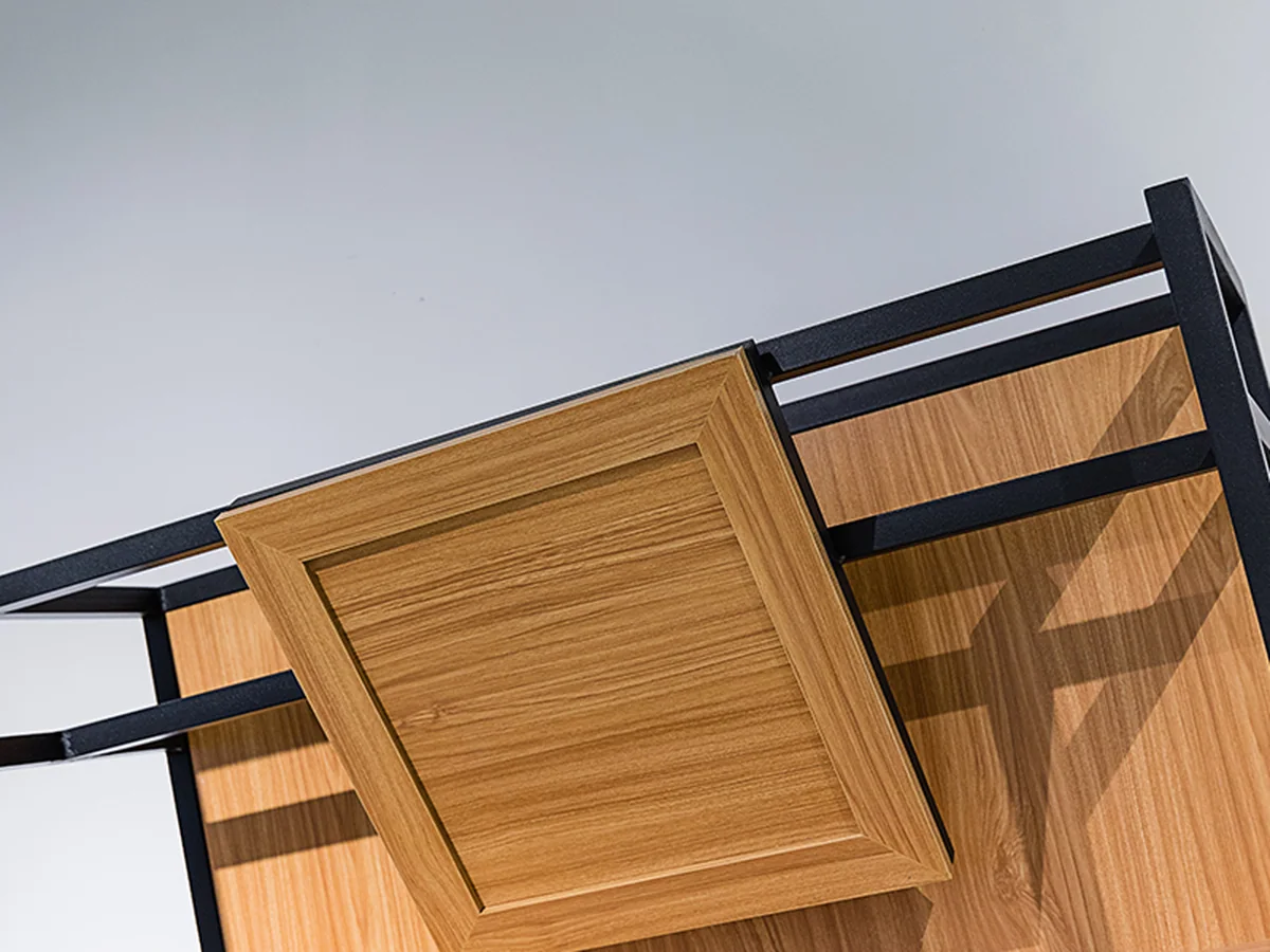Close-up of an angled shelf on the narrow bread rack