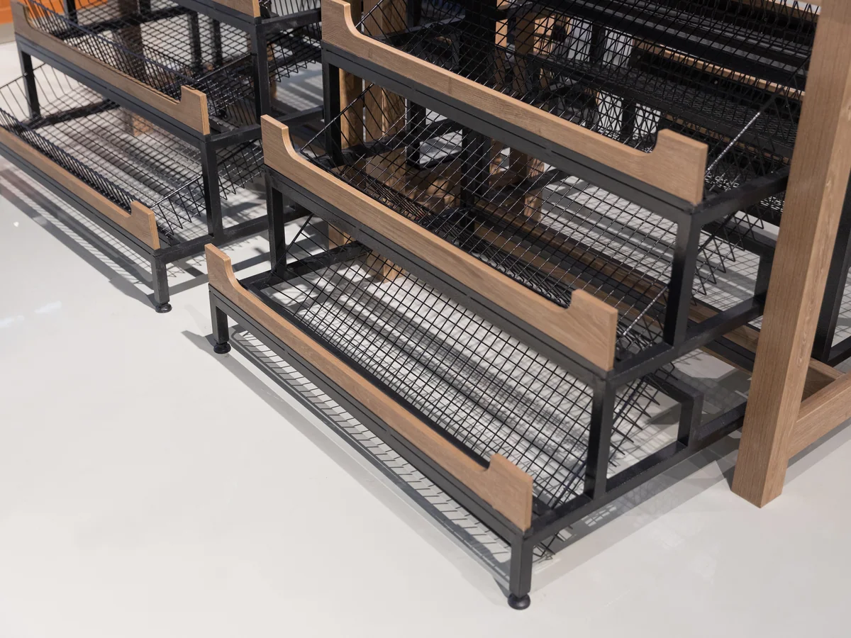 Close-up of a sign header above the bread rack