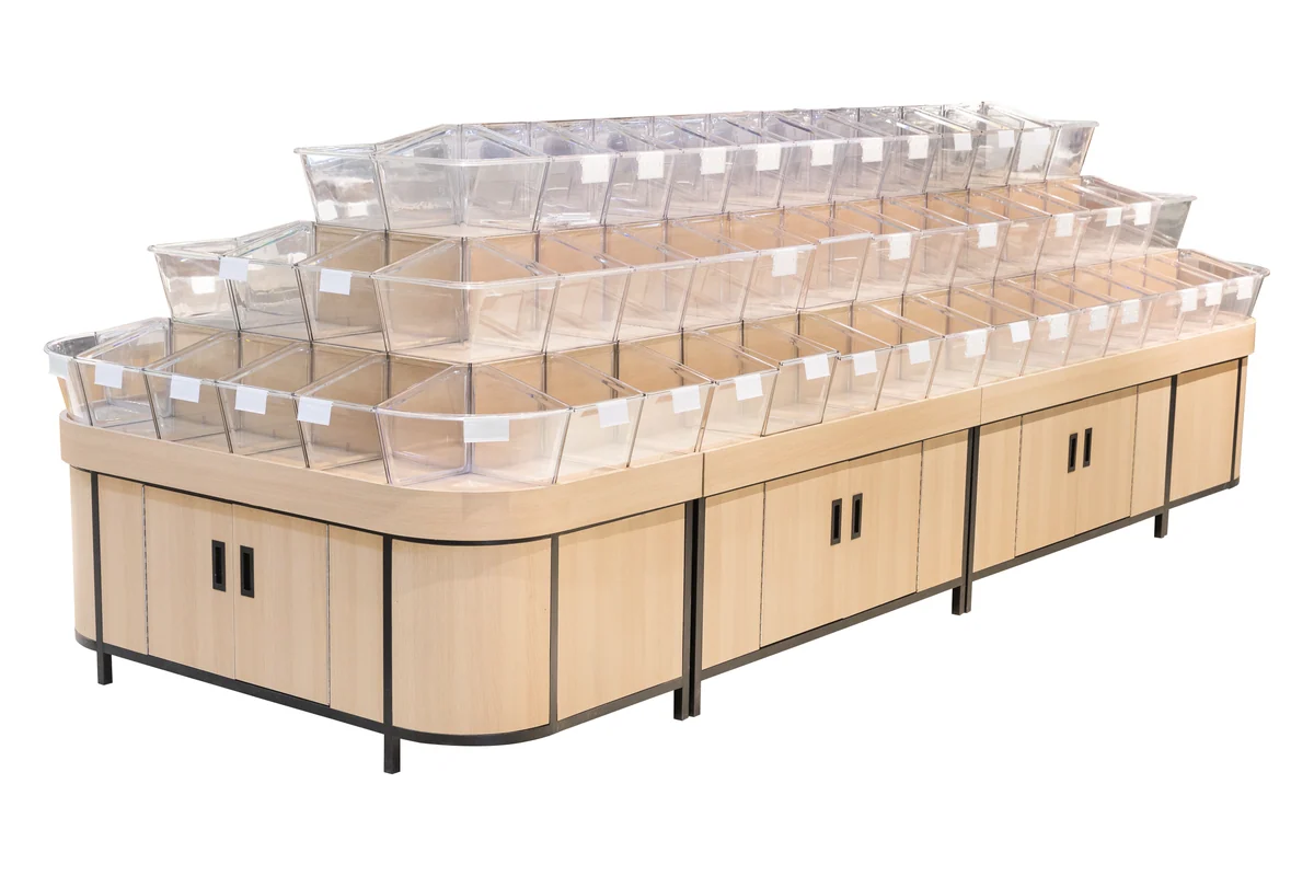 High-capacity supermarket bulk food island with five stepped rows of clear tilt bins