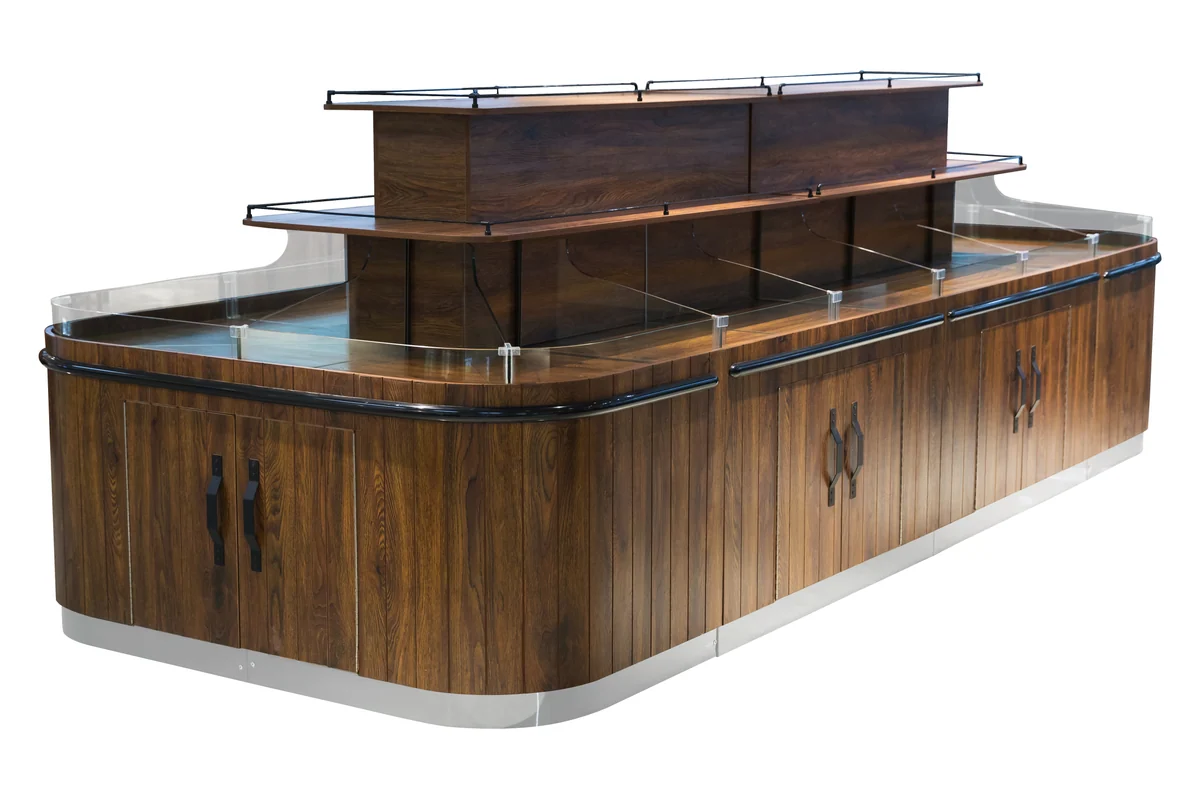 Long supermarket dry goods island with a raised glazed centre spine selling from both flanks