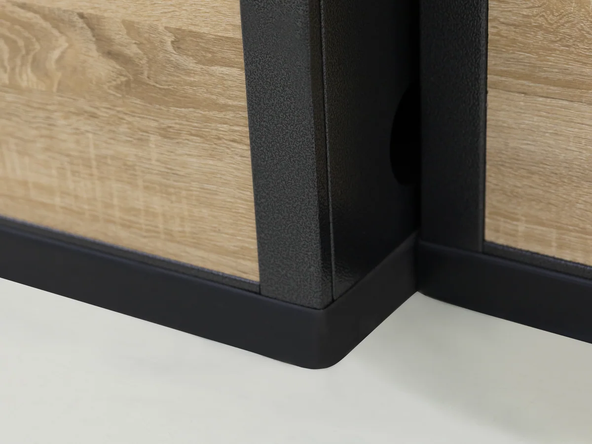 Close-up of the head of the pole carrying the monitor bracket and scanner arm