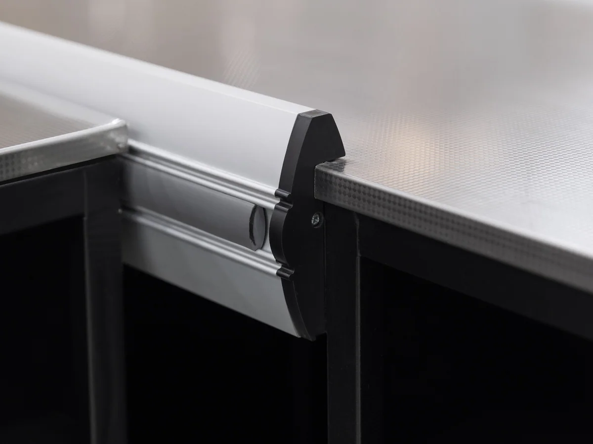 Close-up of the rolled edge along the stainless worktop
