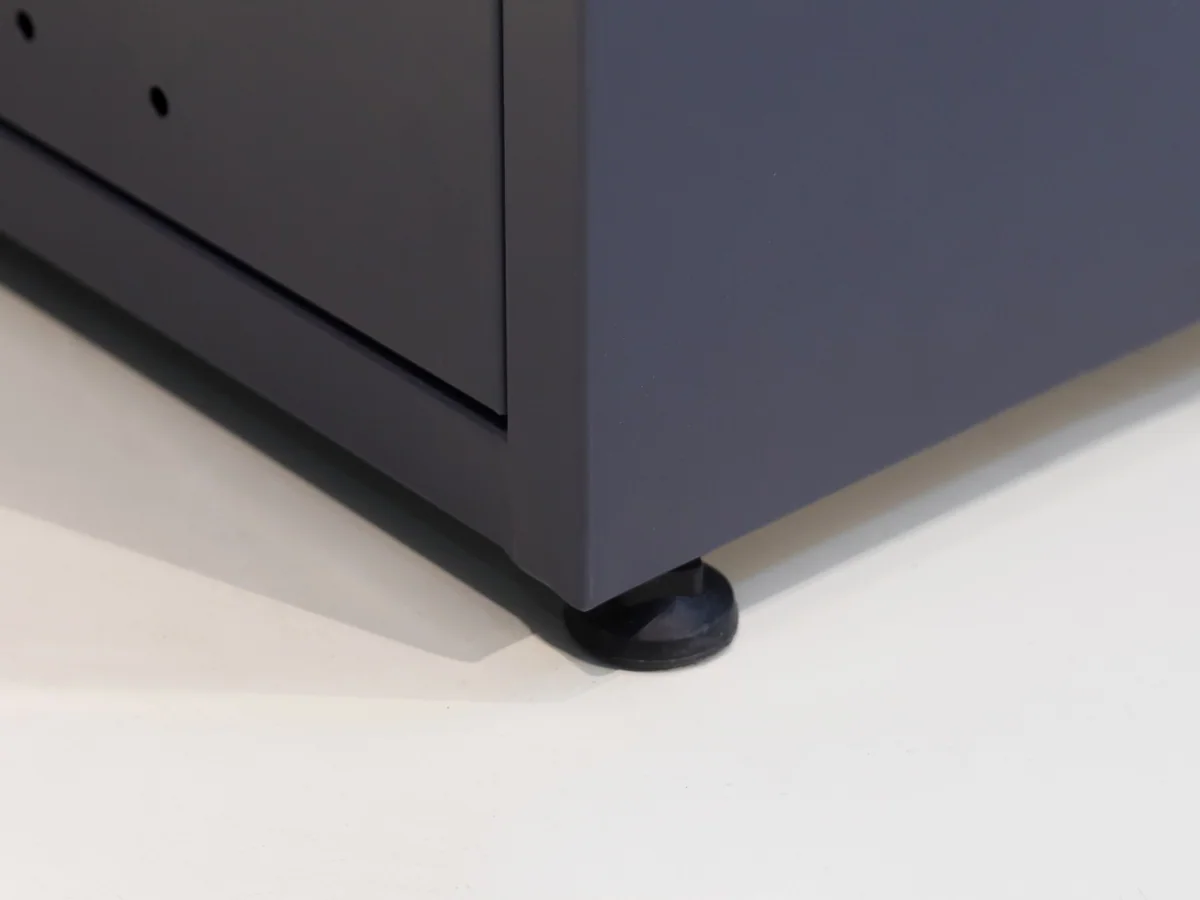 Close-up of the pale timber board facing on the counter body