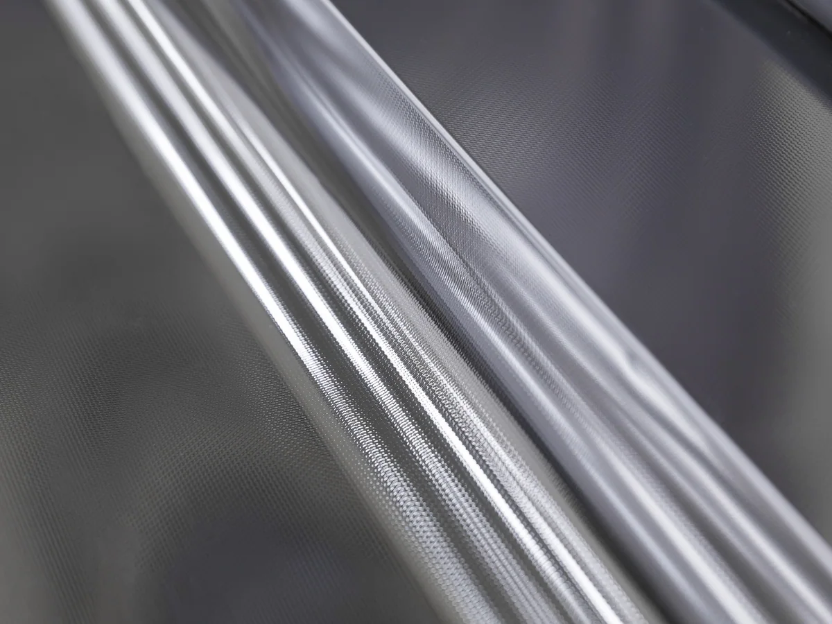 Close-up of one of the two pressed stainless wing tops