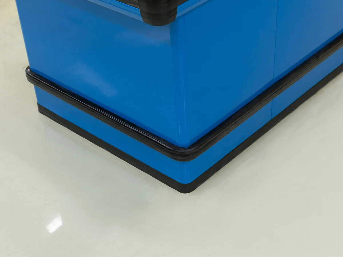 Close-up of the sliding doors running along the base of the counter