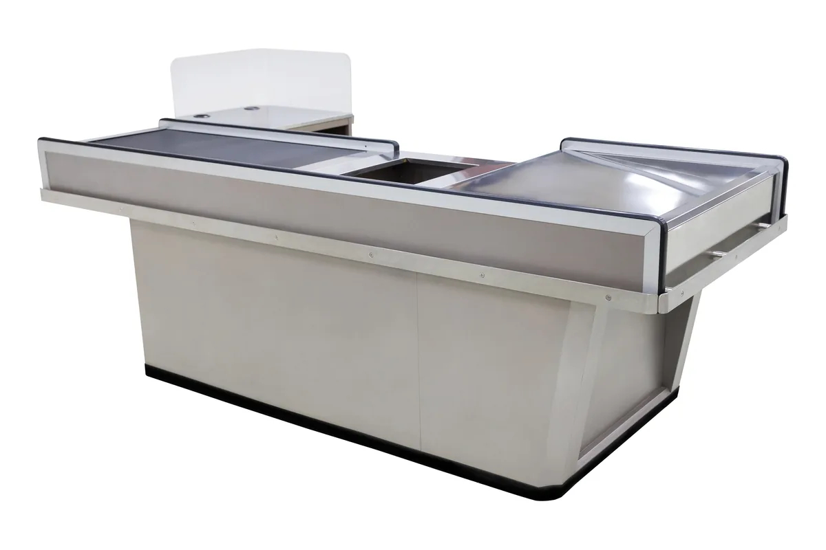 Long supermarket cashier counter with a conveyor belt section, lockable drawer bank and raised end panel