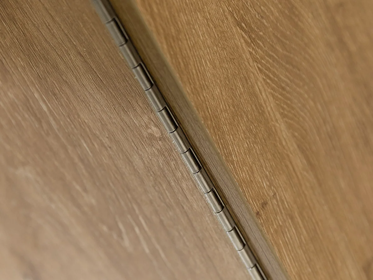 Close-up of the timber body and edge of the service desk