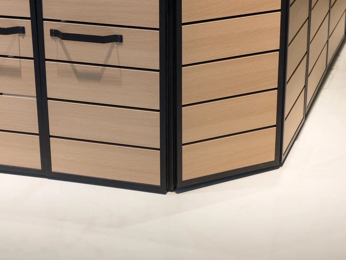 Close-up of the dark deck surface of the island table