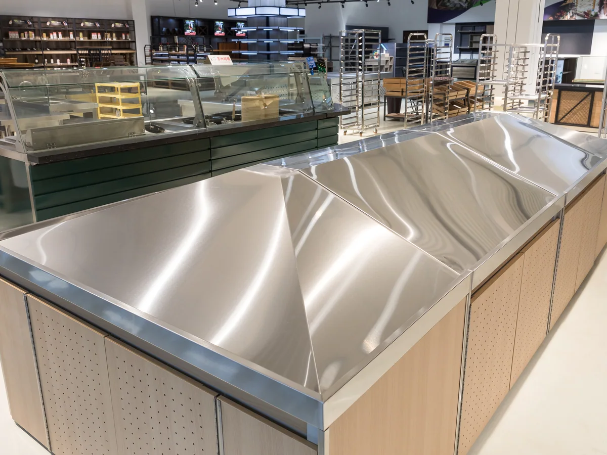 Close-up of the unbroken stainless deck on the plain produce island