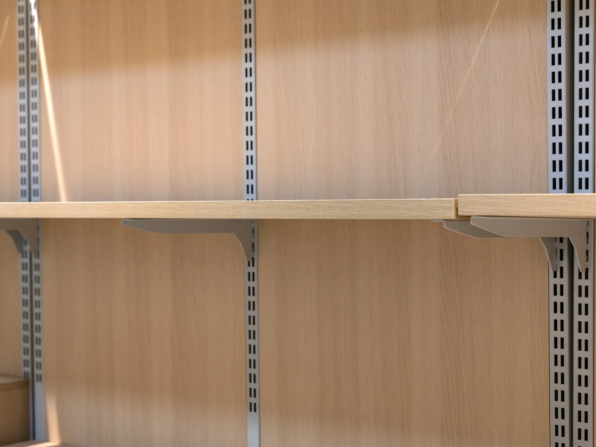 Close-up of the back panel behind the shelves
