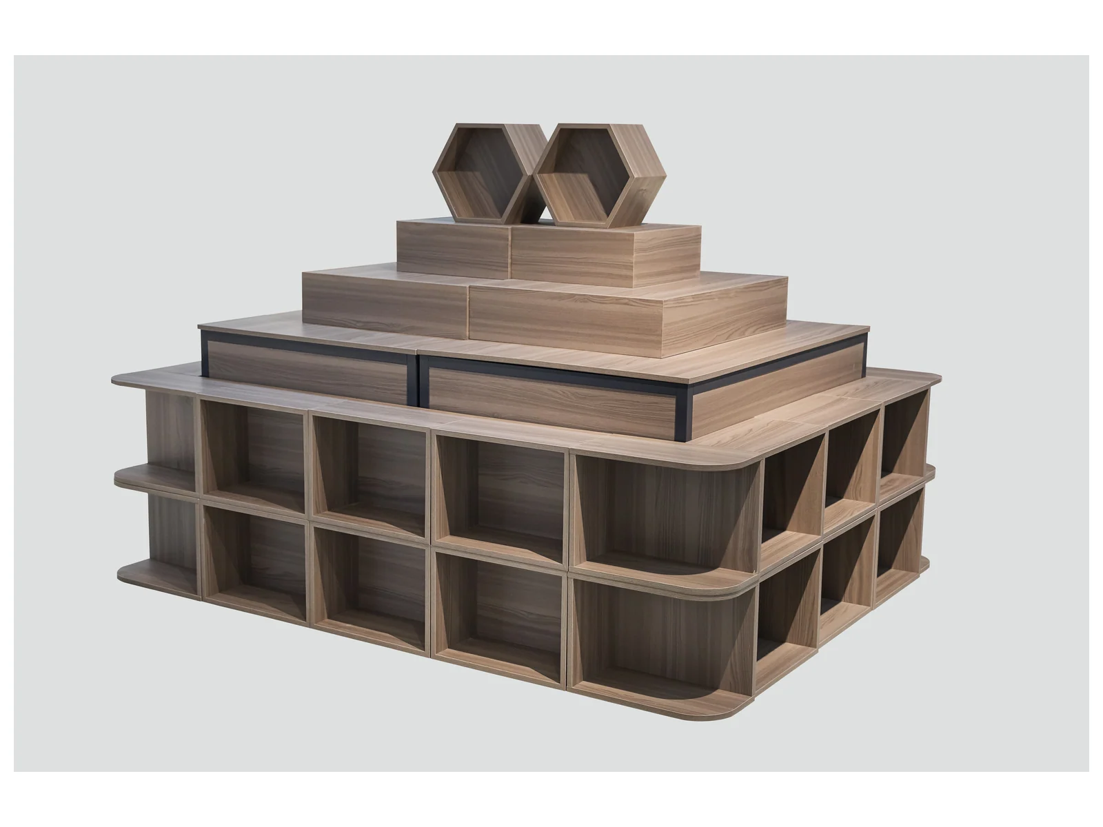 Stepped Promotional Stand with Hexagon Risers photographed from the front on a white studio background