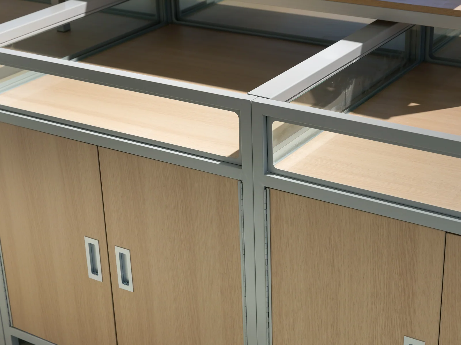 Glazed top promotional island photographed from the corner showing the display top