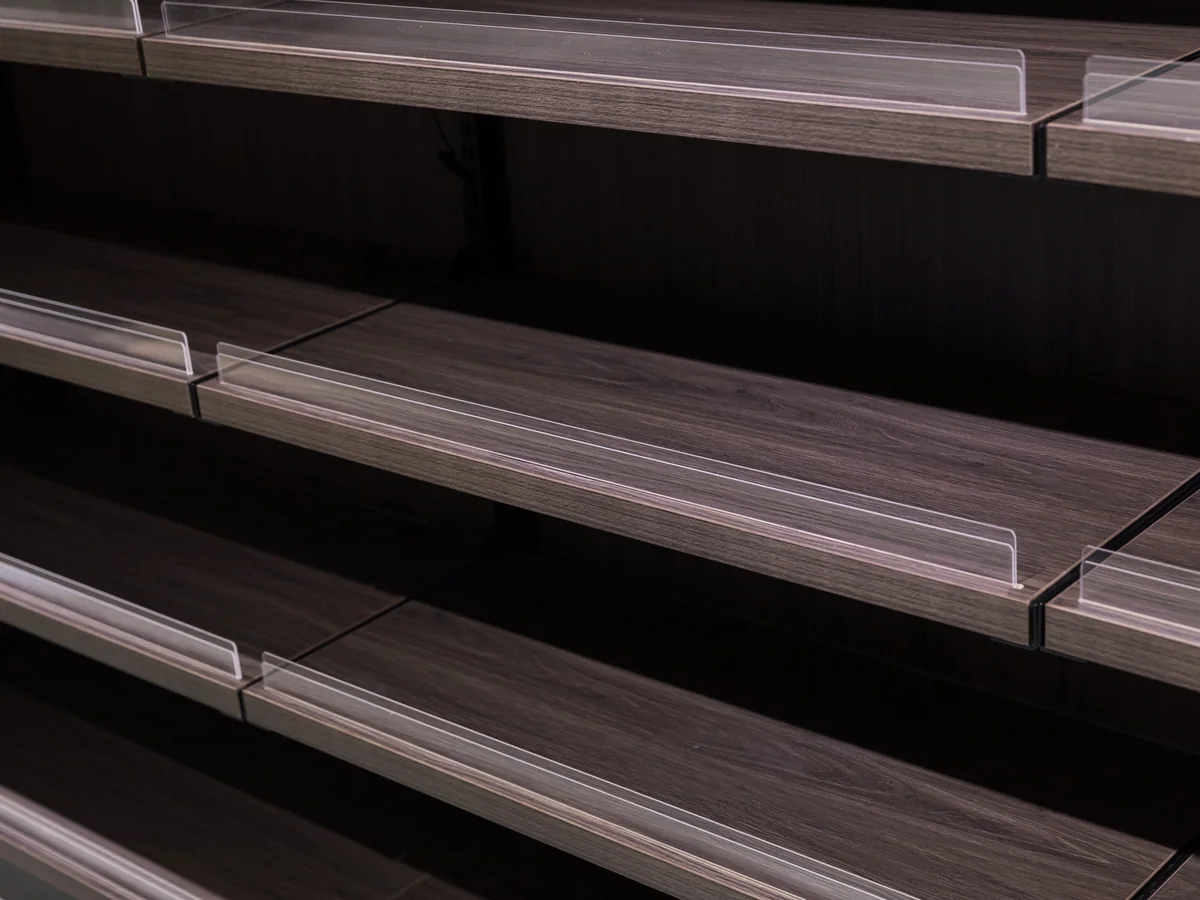 Close-up of the black steel frame at the step transition
