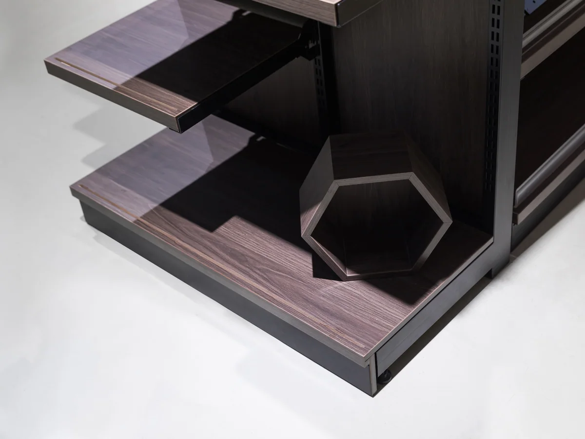Close-up of a dark timber shelf in the gondola bay