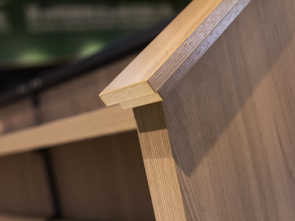 Close-up of the angled base shelf at the bottom of the bay