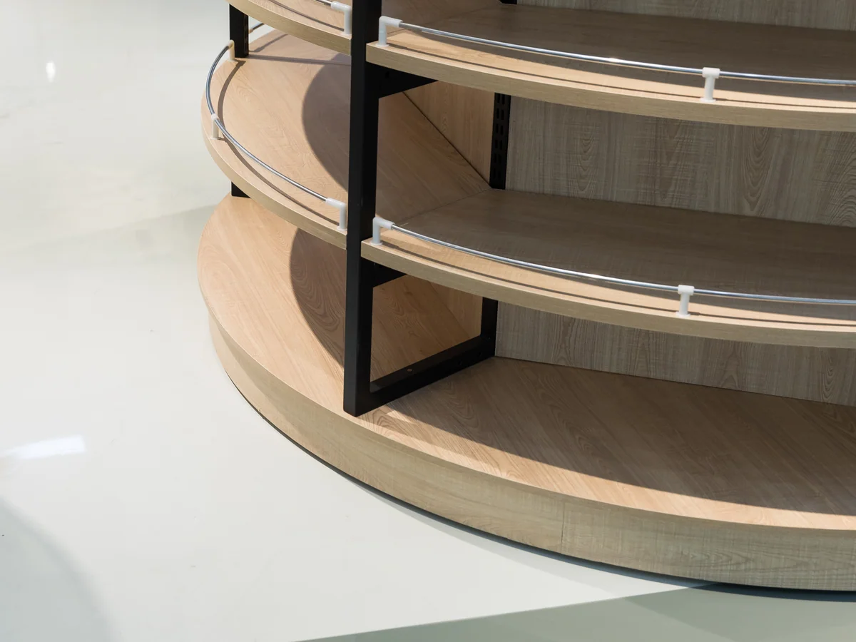 Close-up of a circular shelf ring on the column