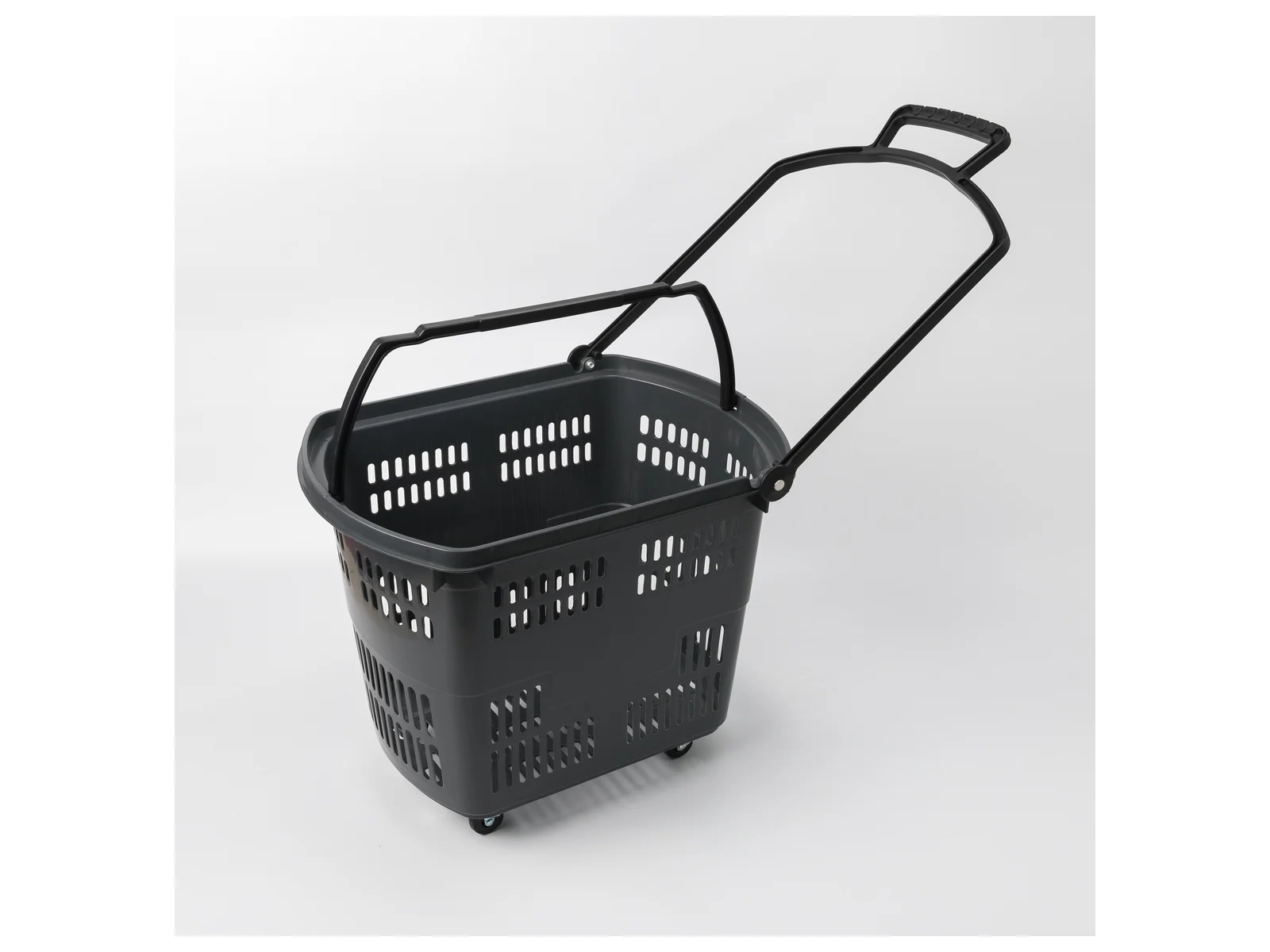 Black Roller Basket with Grab Handle on a white studio background
