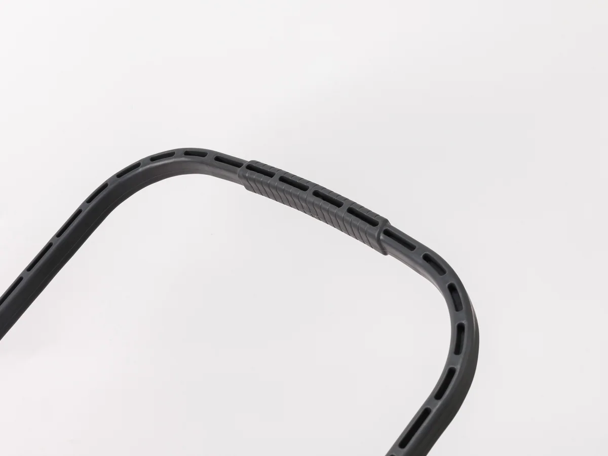 Close-up of the low body profile against the wheels