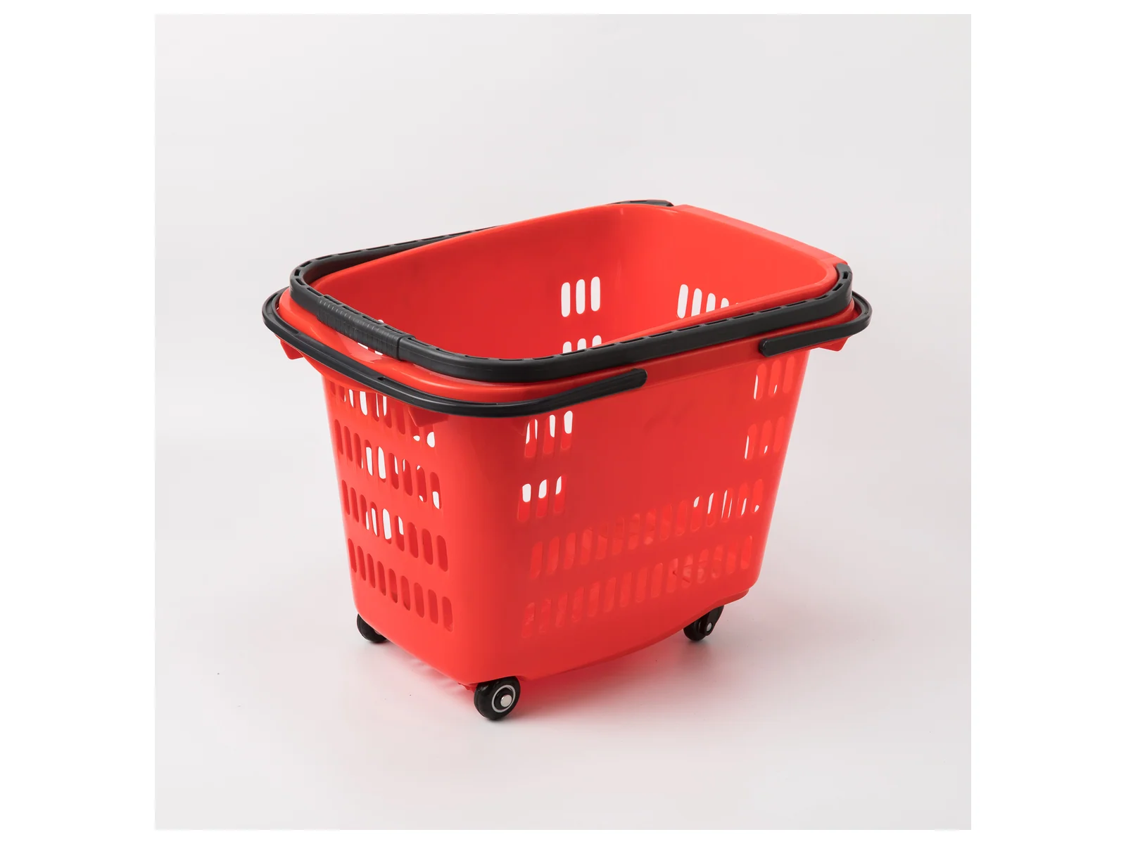 Low Roller Basket with Four Wheels on a white studio background