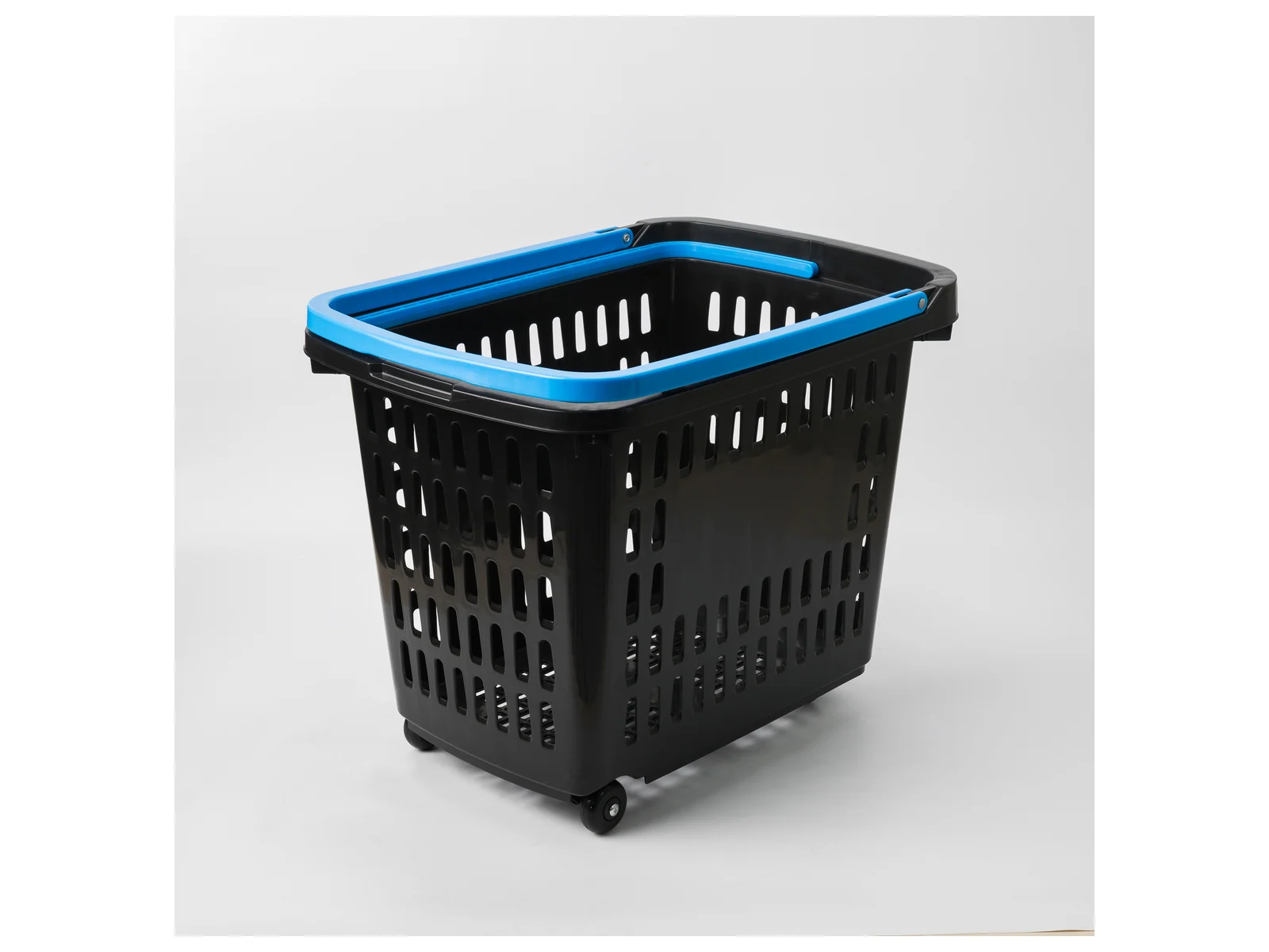 Roller Basket with Blue Rim photographed from the front on a white studio background