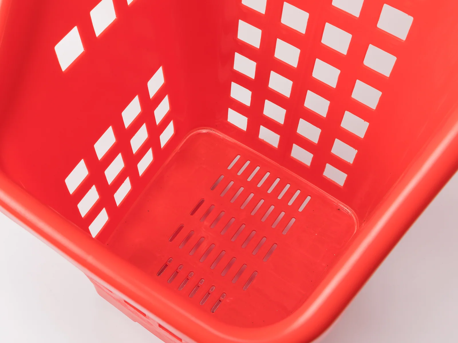 Tall Narrow Roller Basket photographed on a white studio background