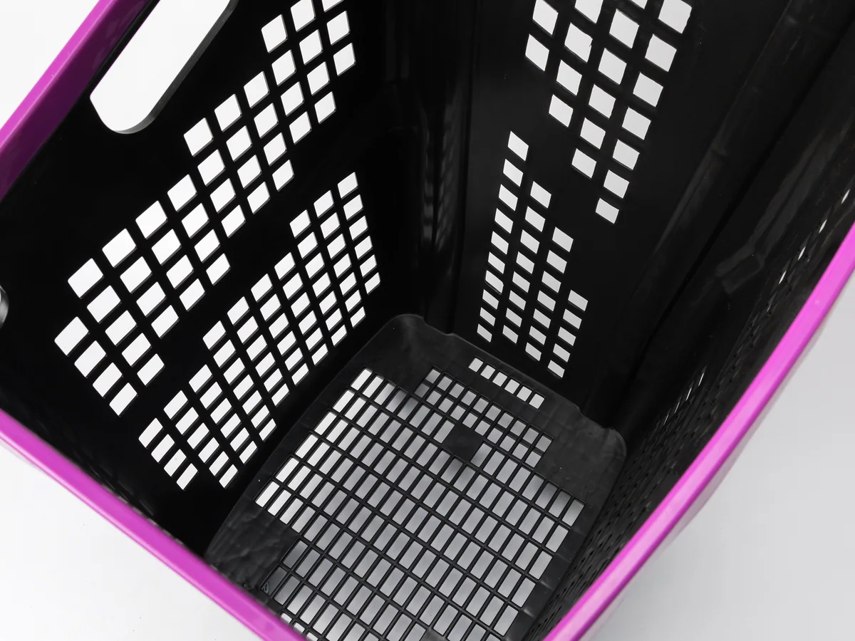 Close-up of the grips visible on a column of stacked baskets