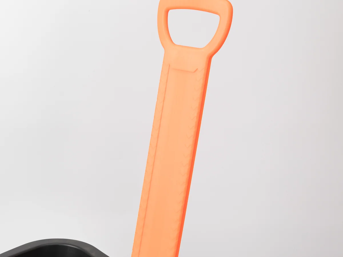 Close-up showing the grab handle and pull handle together