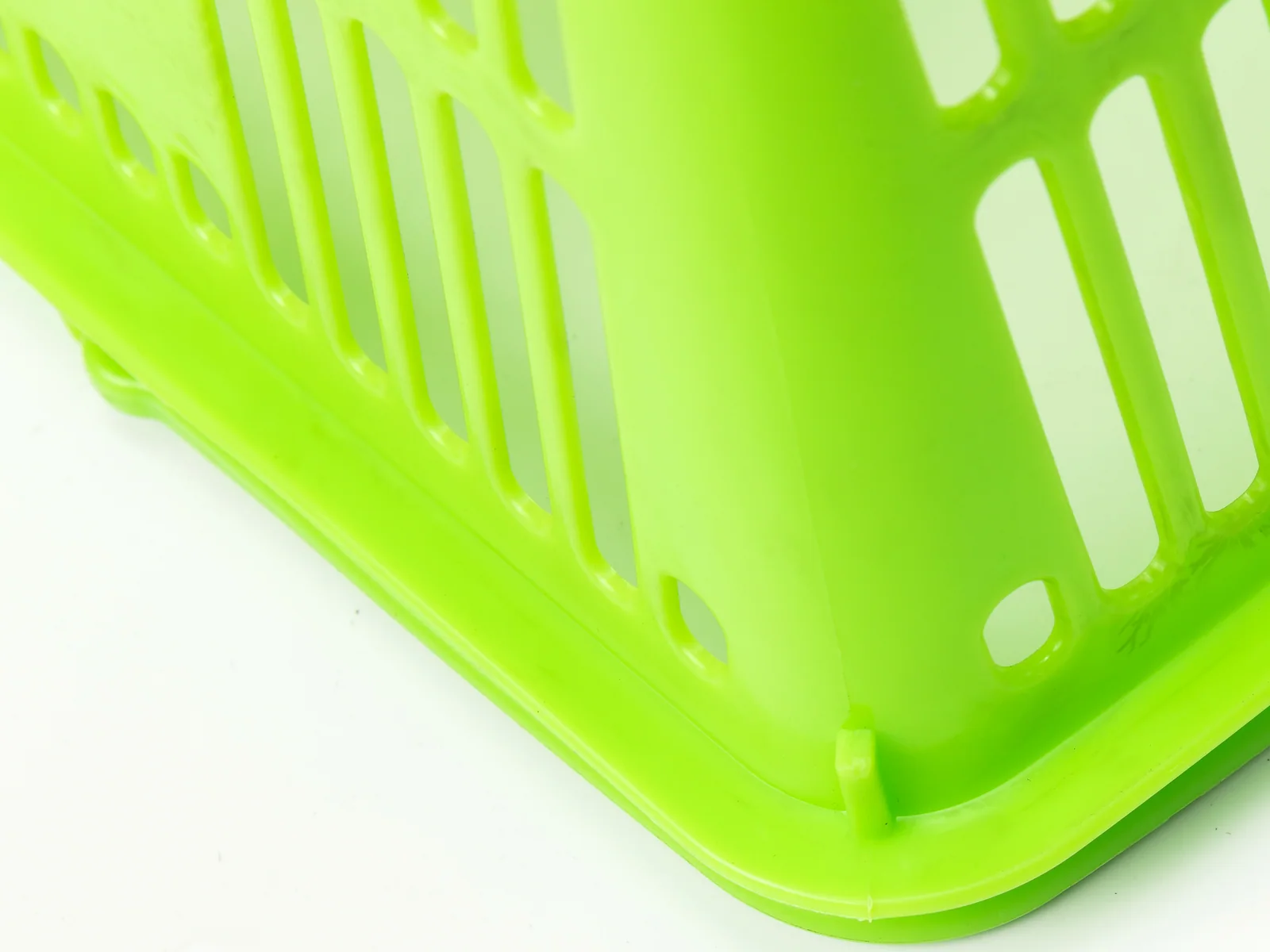 Green Hand Basket with Twin Handles photographed on a white studio background