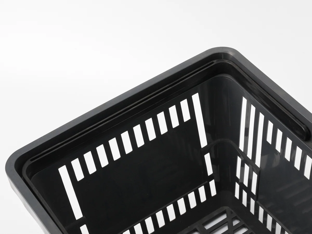 Close-up of the rim where baskets strike each other in a stack