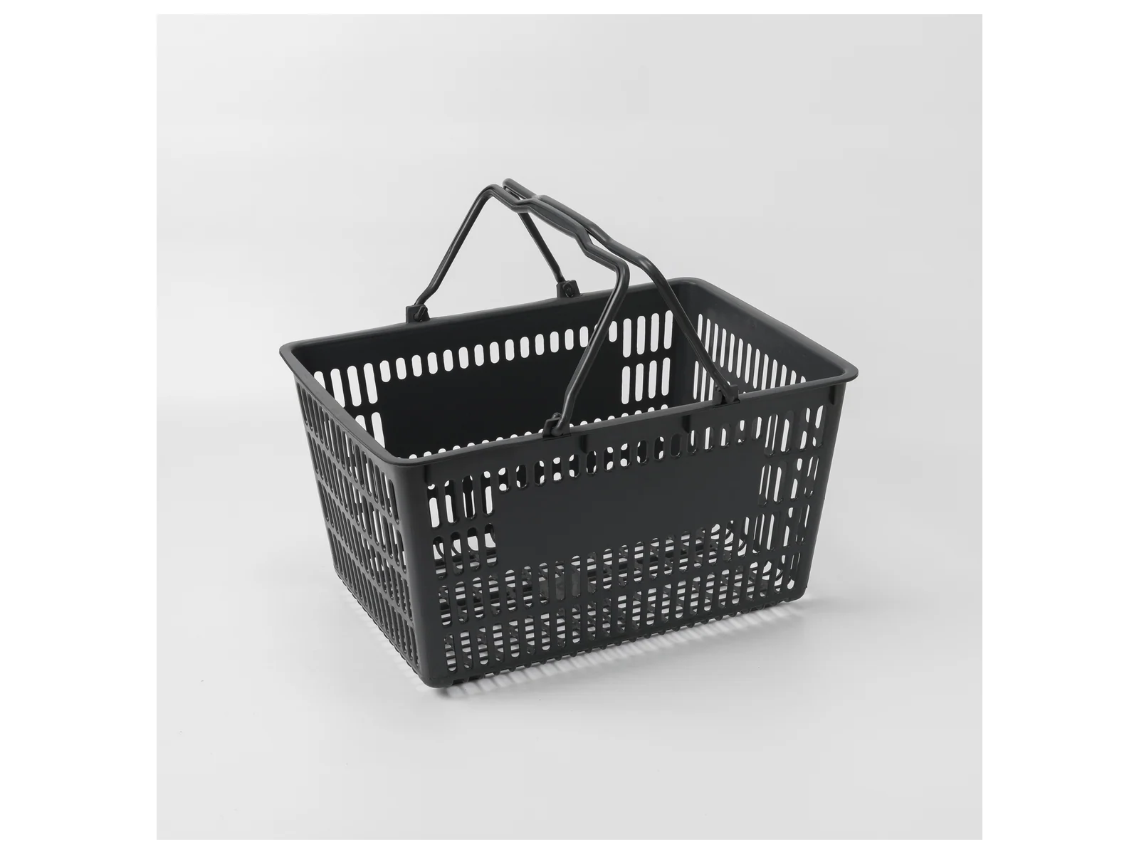 Compact Hand Basket photographed from the front on a white studio background
