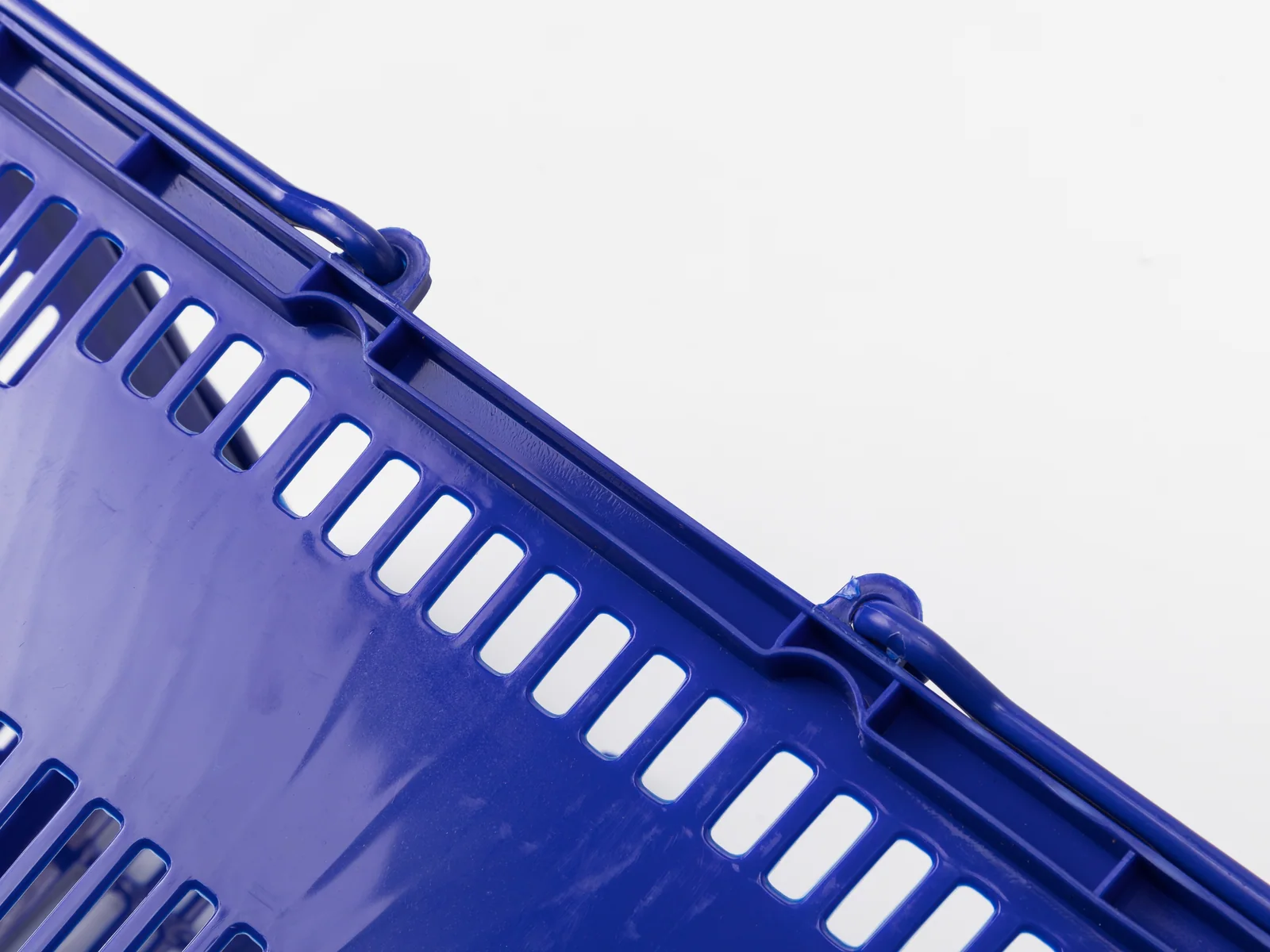 Blue Hand Basket with Twin Handles photographed on a white studio background