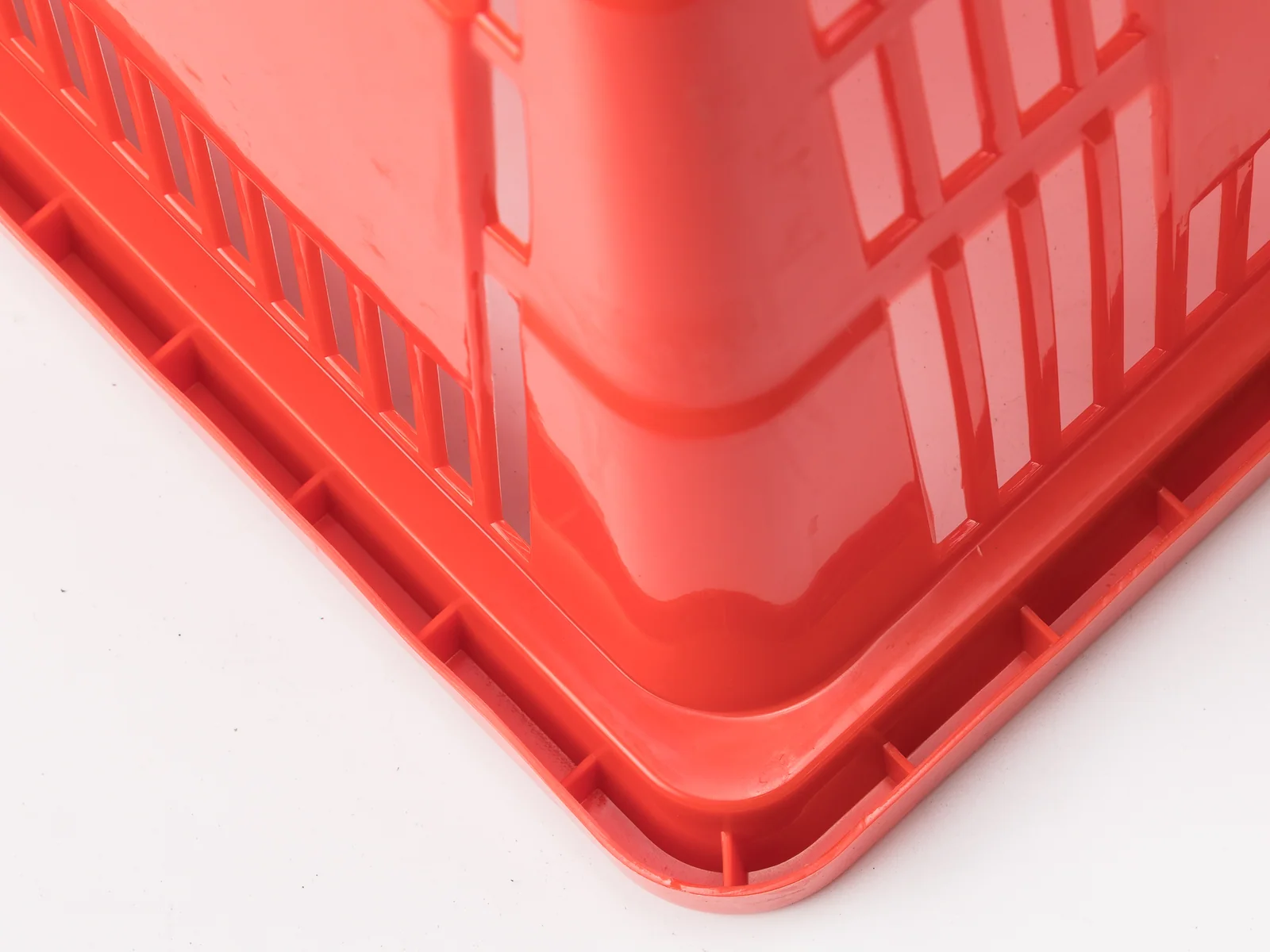Red Hand Basket with Twin Handles photographed on a white studio background