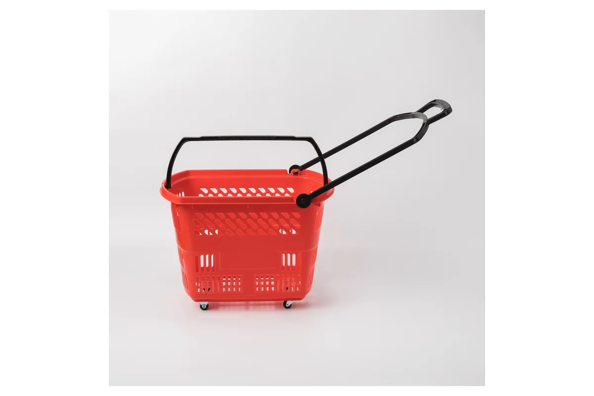 Red supermarket rolling shopping basket with wheels and a long telescopic pull handle
