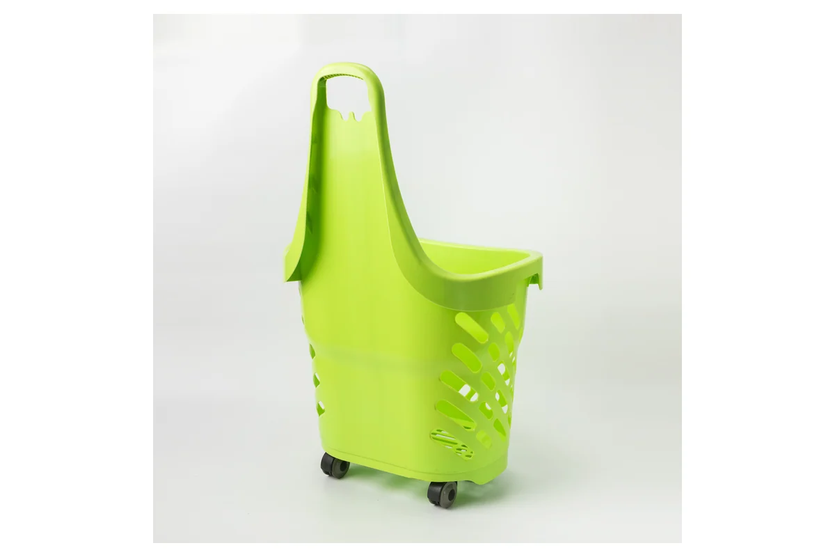 Tall green upright supermarket shopping basket with a moulded pull handle and wheels