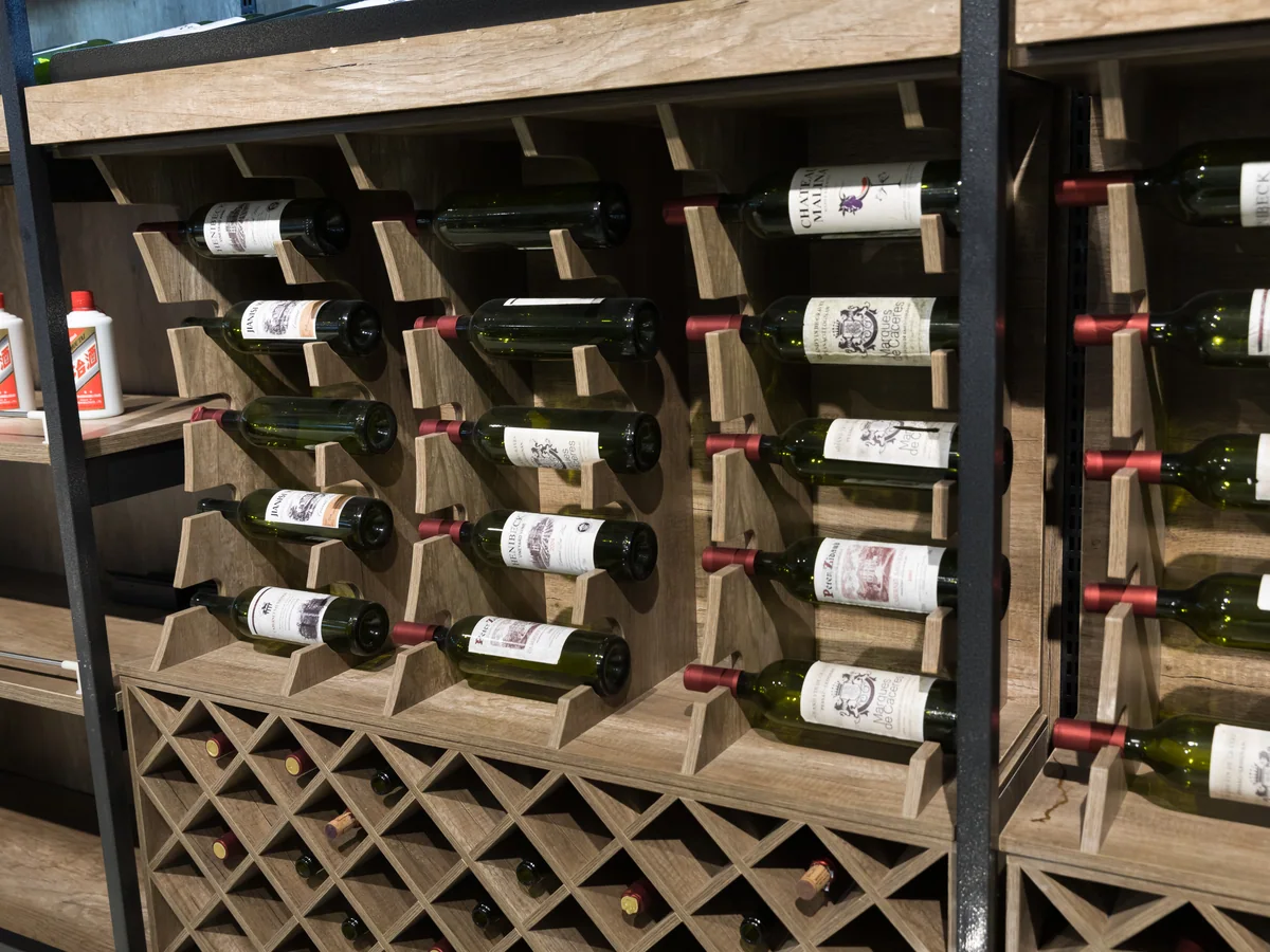 Close-up of the cellular bottle racks in the middle of the wall