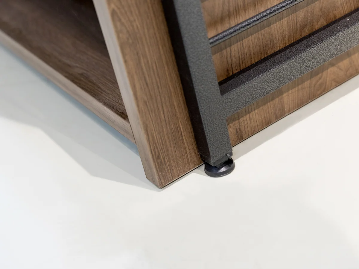 Close-up of the timber base cabinet under the display