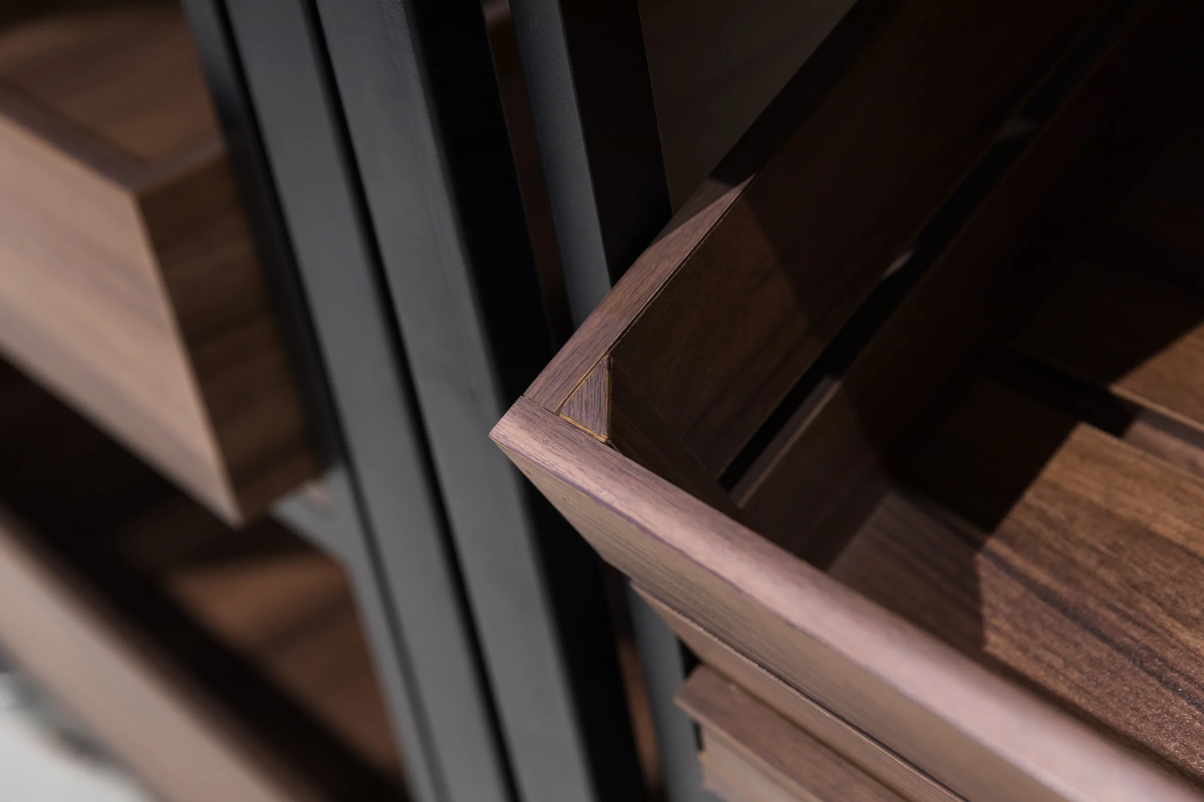 Keshun dark timber tiered wine table on castors with black crate storage below